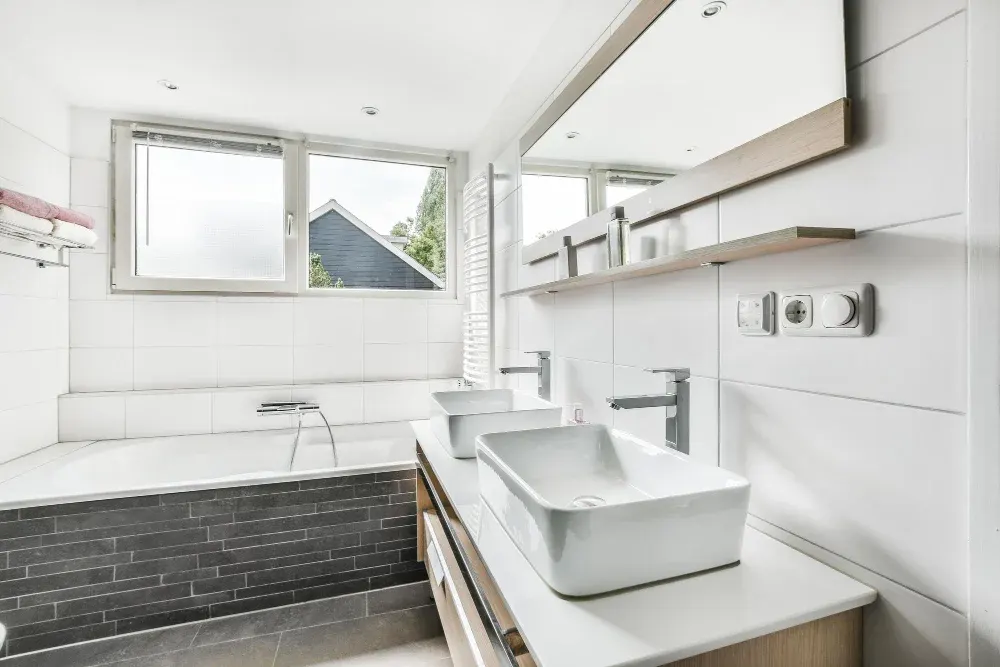 Floating vanity with double vessel sinks